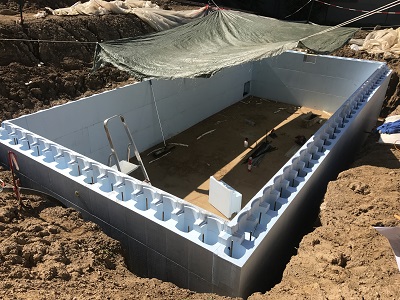 isostone mattoni termoisolanti forma libera piscina interrata fuori terra rivestimento